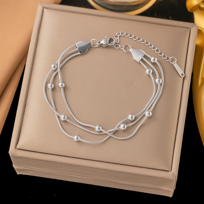 Brazalete Triple Cola de Raton Con Esferas Plateado