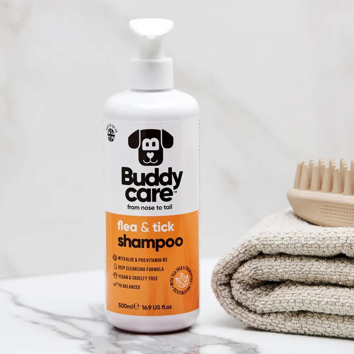 Buddycare Flea and Tick dog shampoo shown in use during a bath
