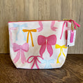 Coquette Bows Canvas Pouch - Lyla's: Clothing & Gifts - Online and Rockwall Texas Boutique