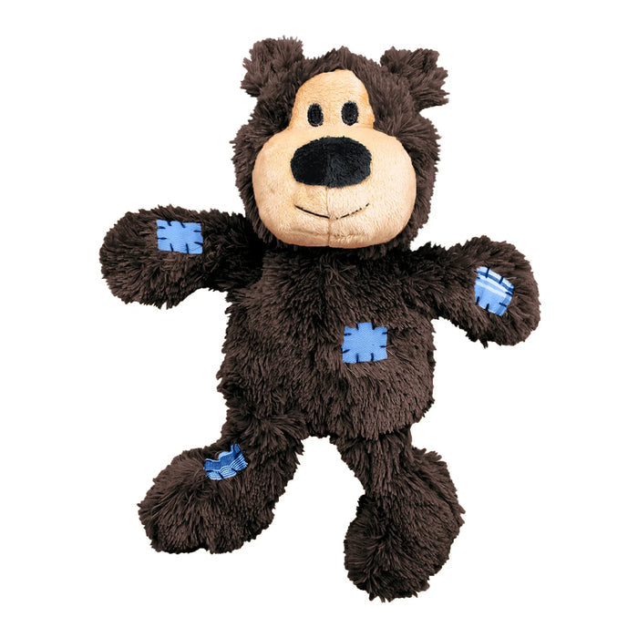 KONG Wild Knots Bear plush dog toy in dark brown with a cream muzzle and blue star patches stitched to the paws