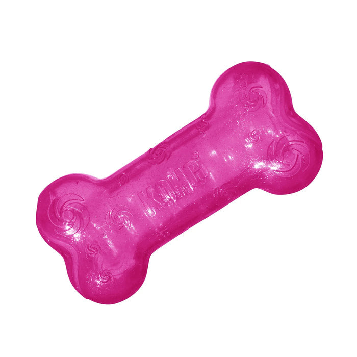KONG Squeezz Crackle Bone in translucent pink, a flexible bone-shaped dog toy with a ridged, textured surface