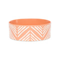 Scruffs Aztec stoneware pet bowl in terracotta orange with a white geometric pattern