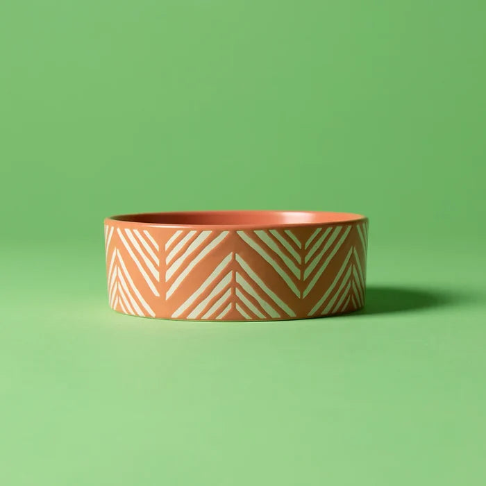 Two Scruffs Aztec bowls in contrasting colours seen together