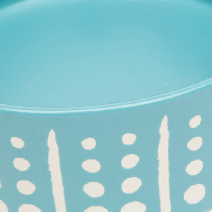 Detail of the white wax resist banding on the Scruffs Aztec turquoise glaze