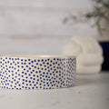 Scruffs Blue Polka stoneware pet food bowl, 15cm across with a blue polka dot pattern