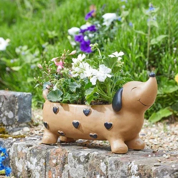 Smart Garden Pooch Heart planter shaped as a standing dog holding a heart, with a planting recess in its back