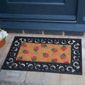 Strawberry-print coir doormat insert on a natural coir ground, rectangular 53 by 23cm