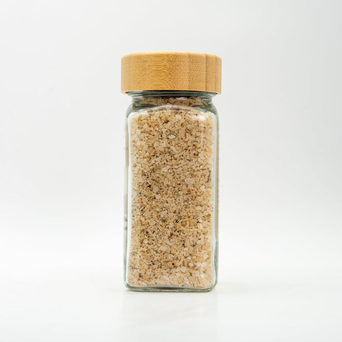 Unlabeled salt jar to show salt color and texture.