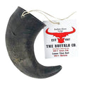 The Buffalo Co. Buffalo Horn in the large 6-8 inch size, a natural dried horn dog chew