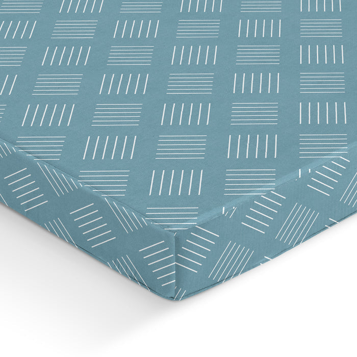 Close-up of the Uratex Classic Mattress in Tricot Cover in teal and gray