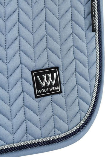 Woof Wear Herringbone dressage pad in steel blue, further view showing the girth pad and mesh liner